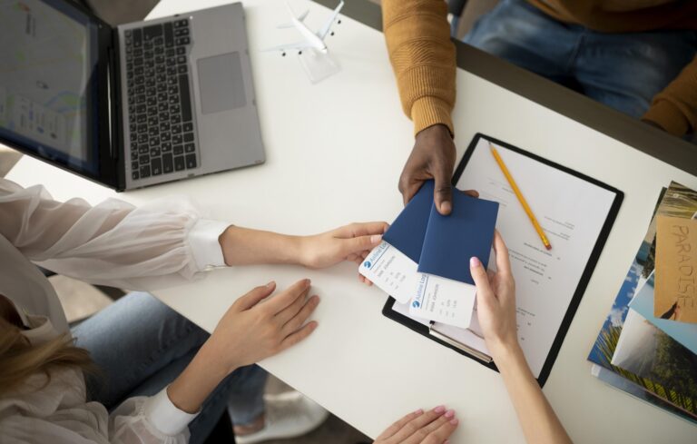 close-up-hands-holding-tickets